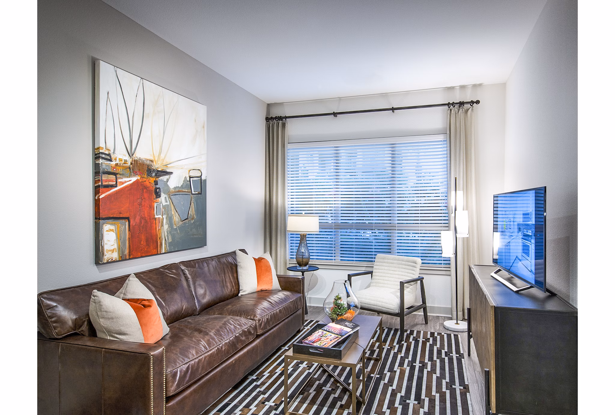 Spacious living room with modern decor at Vora Mission Valley West Apartments, offering luxury living spaces for comfort and style