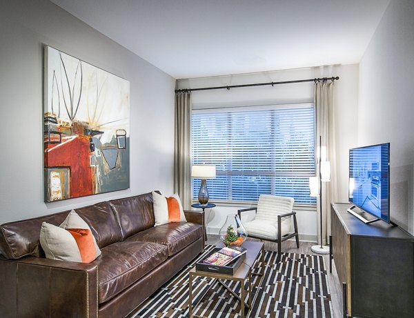 Spacious living room with modern decor at Vora Mission Valley West Apartments, offering luxury living spaces for comfort and style
