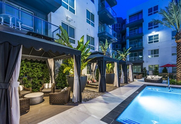 Luxurious poolside cabanas at Vora Mission Valley West Apartments