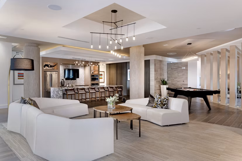 Modern clubhouse at Vora Mission Valley East Apartments featuring luxurious seating and social areas