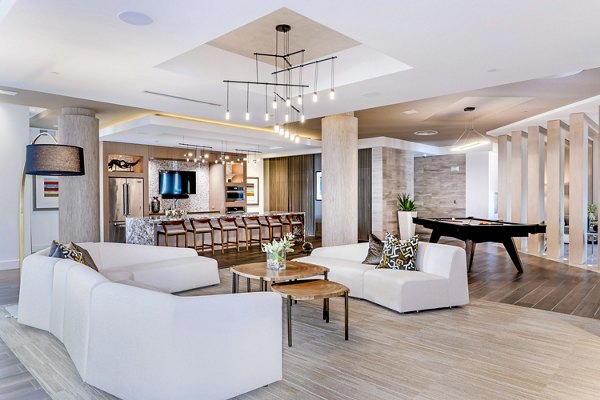 Modern clubhouse at Vora Mission Valley East Apartments featuring luxurious seating and social areas