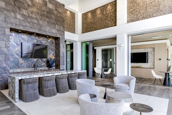 Modern clubhouse kitchen with stainless steel appliances at Vora Mission Valley East Apartments