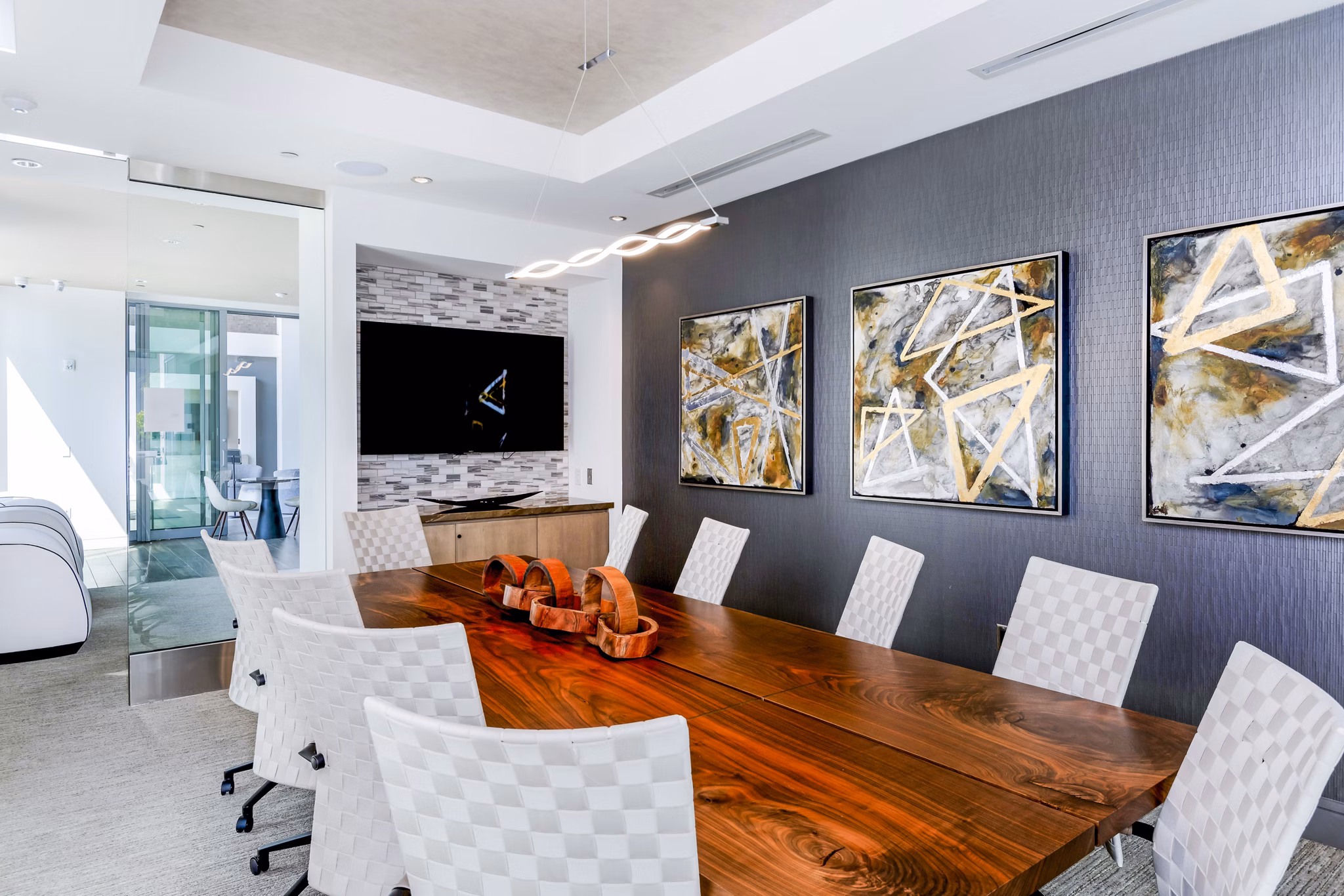 Contemporary clubhouse meeting facility with ergonomic seating at Vora Mission Valley East Apartments