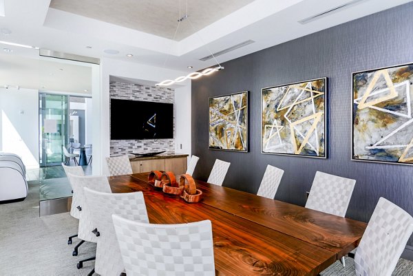 Contemporary clubhouse meeting facility with ergonomic seating at Vora Mission Valley East Apartments
