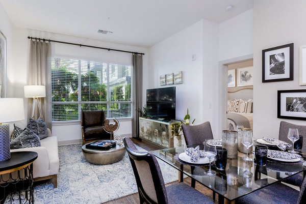 Dining room with modern furnishings at Vora Mission Valley East Apartments