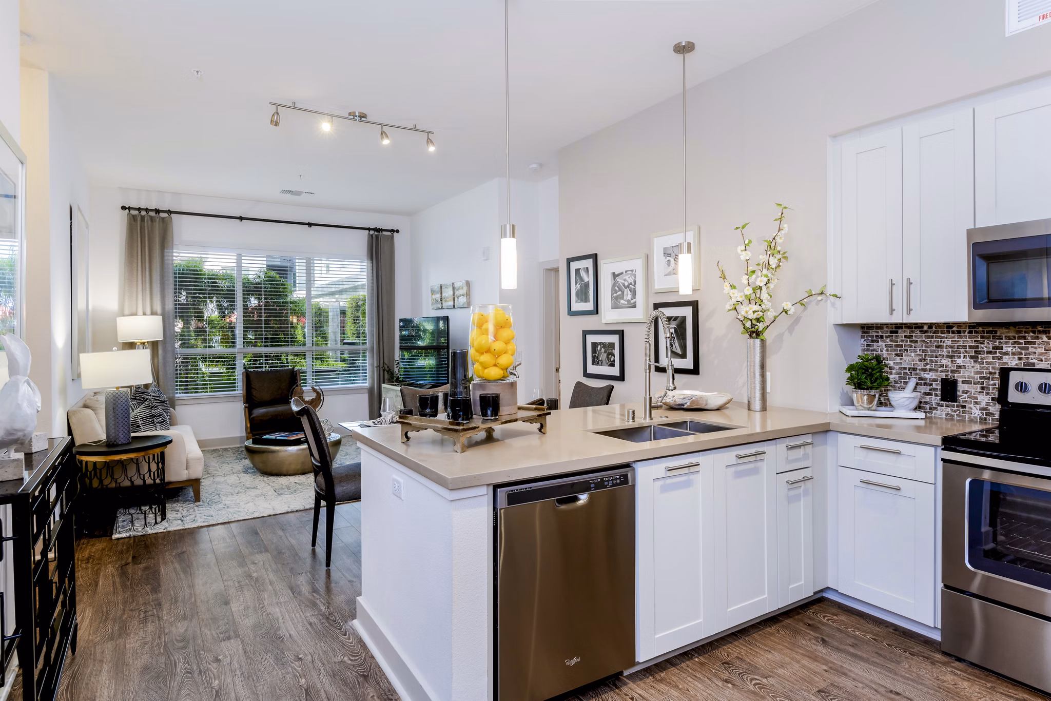 Modern kitchen with stainless steel appliances at Vora Mission Valley East Apartments