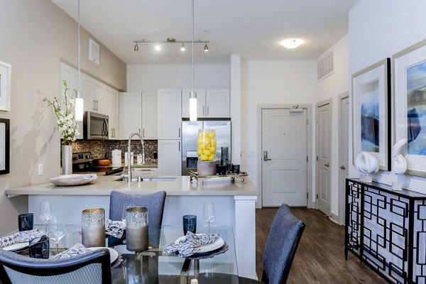 Vora Mission Valley East: Elegant dining room with modern decor and ample natural light in luxury apartments
