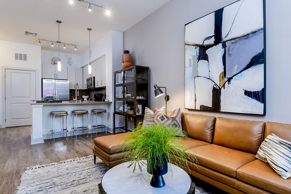 Spacious living room with modern furnishings at Vora Mission Valley East Apartments