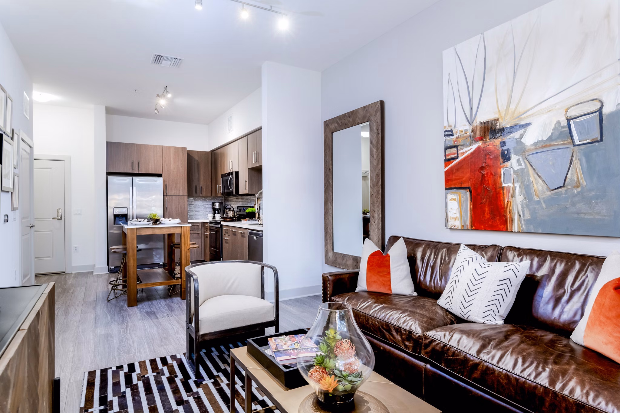 Spacious living room with modern decor in Vora Mission Valley East Apartments