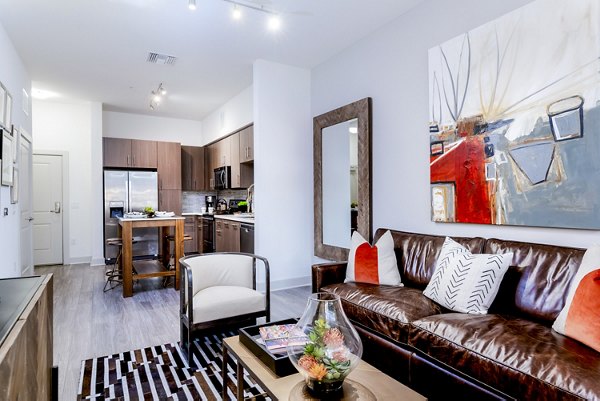 Spacious living room with modern decor in Vora Mission Valley East Apartments