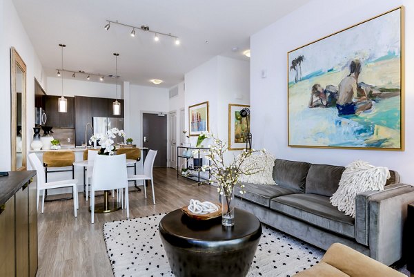 Living room featuring contemporary design and cozy seating area at Vora Mission Valley East Apartments