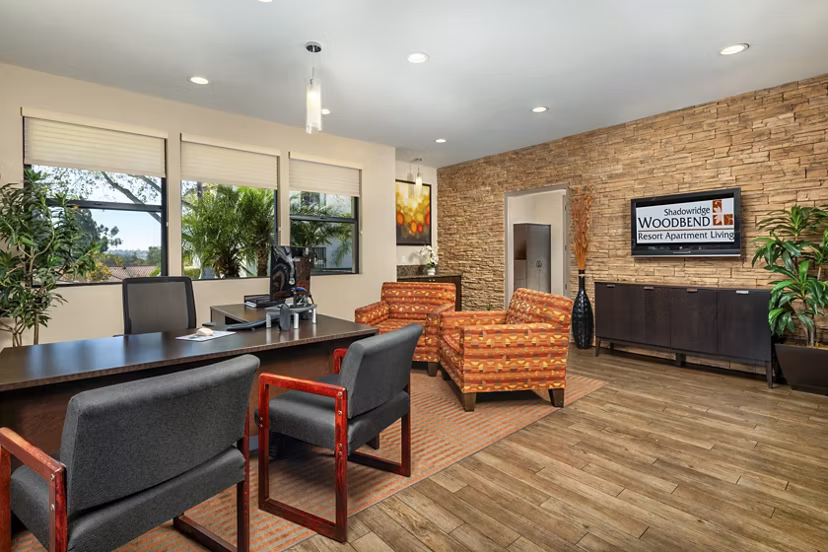 Clubhouse and leasing office with modern design at Shadowridge Woodbend Apartments