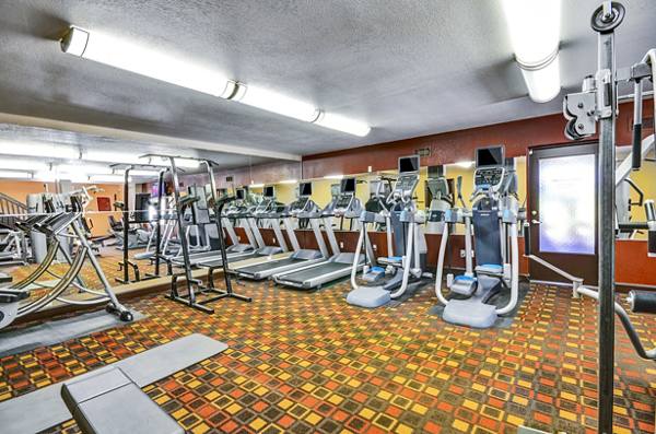 fitness center at Shadowridge Woodbend Apartments