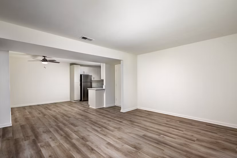 Shadowridge Woodbend Apartments: Cozy living room with modern decor and natural light, perfect for luxury apartment living