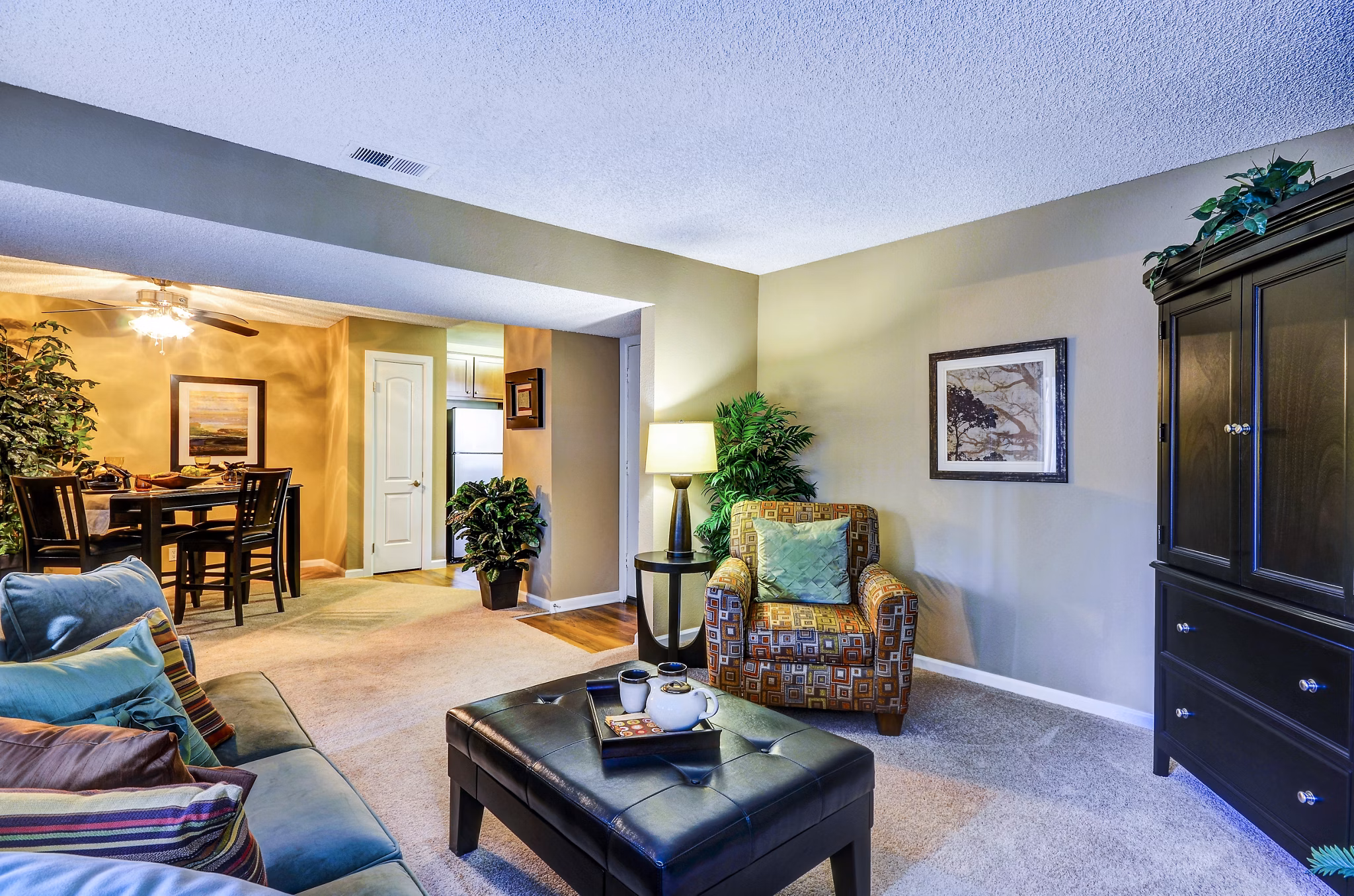 Shadowridge Woodbend Apartments: Cozy living room with modern decor and natural light, perfect for luxury apartment living