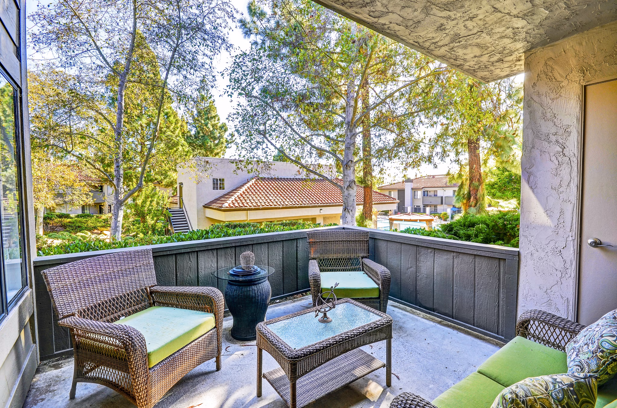 Private balcony with scenic views at Shadowridge Woodbend Apartments luxurious residences