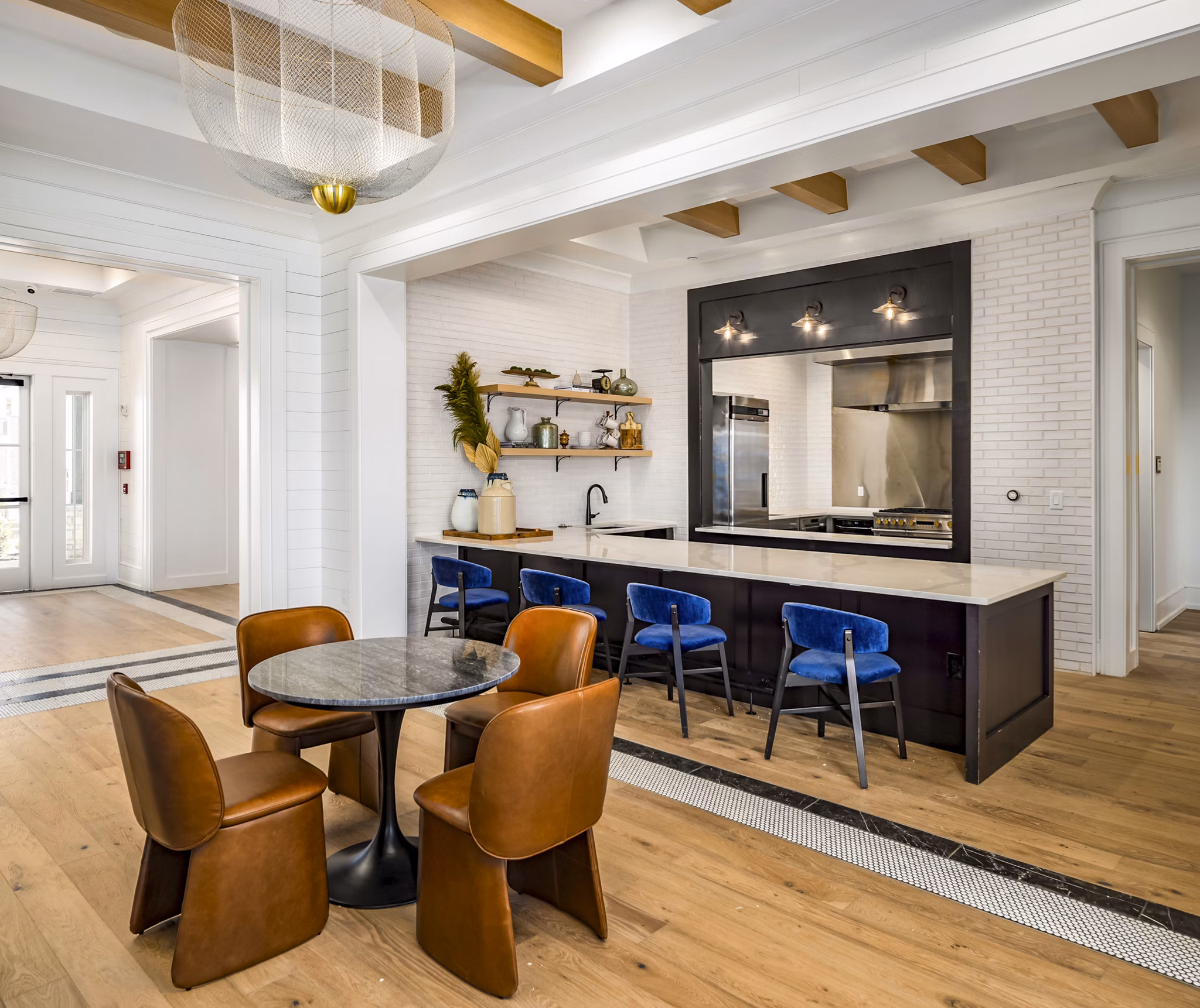 Clubhouse lobby with modern seating and decor at NOVEL Harpeth Heights luxury apartments by Crescent Communities