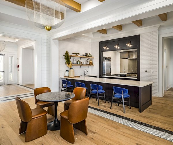 Clubhouse lobby with modern seating and decor at NOVEL Harpeth Heights luxury apartments by Crescent Communities