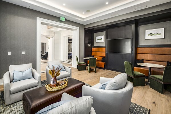 Sophisticated clubhouse/lobby featuring modern decor at NOVEL Harpeth Heights by Crescent Communities Apartments