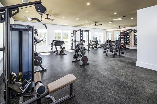 Modern fitness center with state-of-the-art equipment at NOVEL Harpeth Heights by Crescent Communities Apartments
