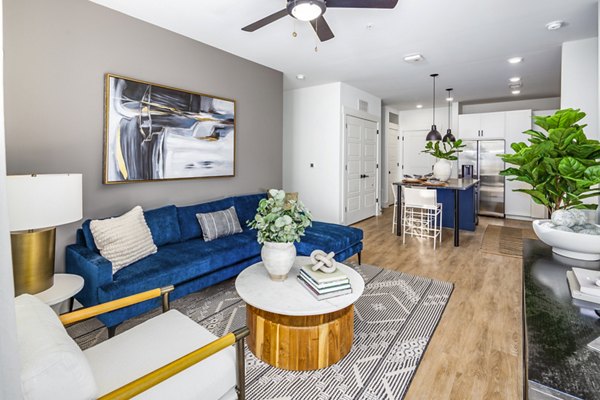 Spacious living room with modern furnishings at NOVEL Harpeth Heights by Crescent Communities Apartments