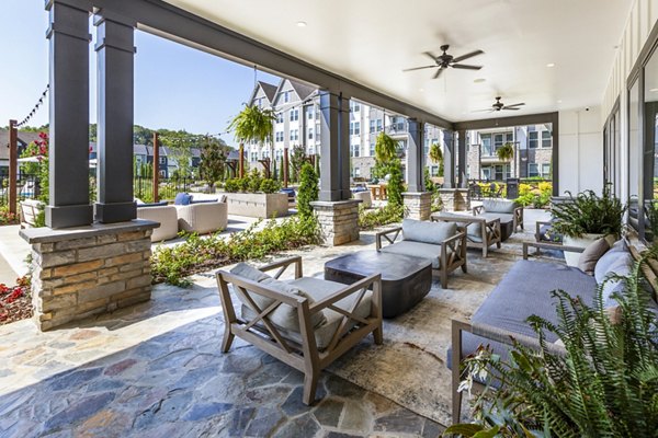 Patio with modern seating and fire pit at NOVEL Harpeth Heights luxury apartments