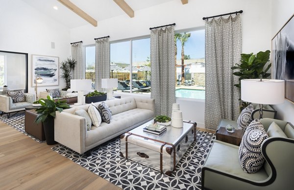 Clubhouse featuring modern design and seating at Kendry Apartments