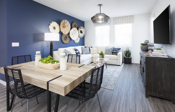 Elegant dining room with modern lighting in Kendry Apartments offering luxury living experiences