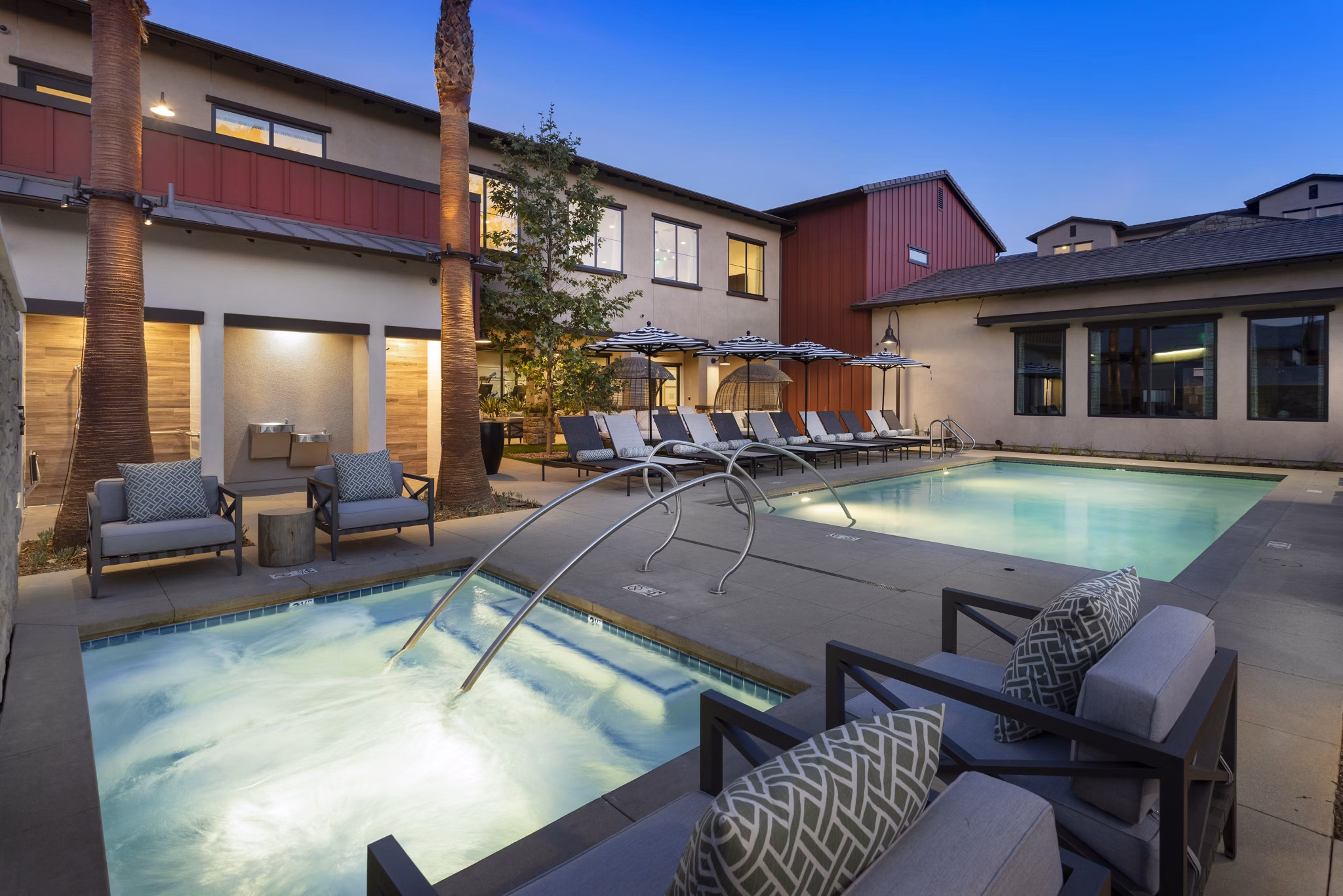 Resort-style pool with cabanas at Kendry Apartments