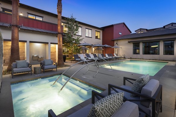 Resort-style pool with cabanas at Kendry Apartments