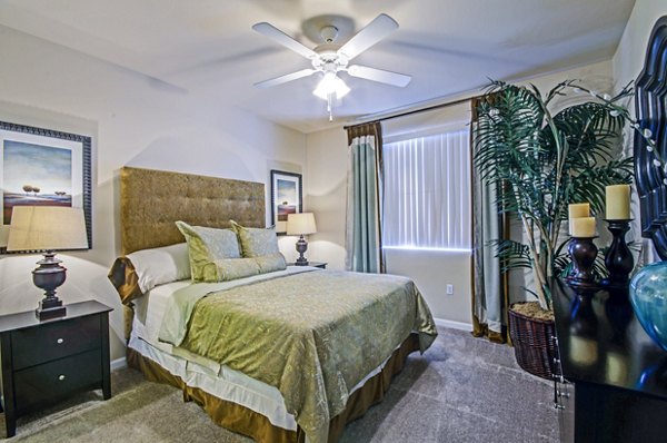 Cozy bedroom with modern decor at Ridgestone Apartments