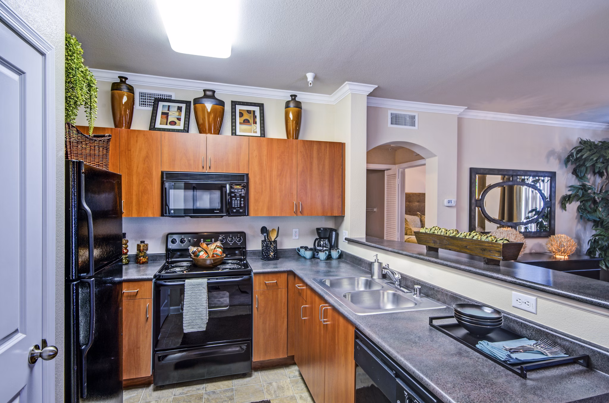 Modern kitchen with stainless steel appliances at Ridgestone Apartments