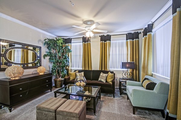 Spacious living room with modern furnishings at Ridgestone Apartments