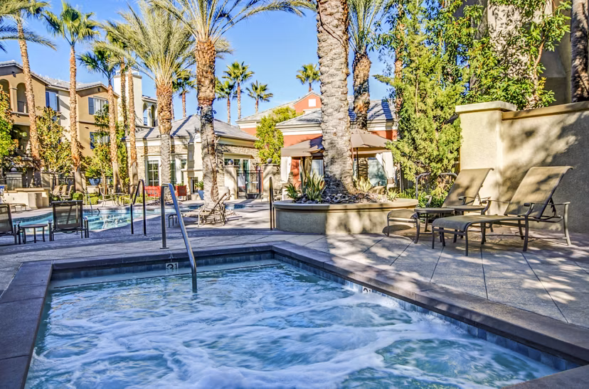 Relaxing pool and hot tub area at Ridgestone Apartments, offering luxurious outdoor amenities for ultimate comfort