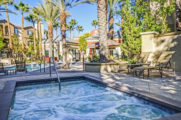 Relaxing pool and hot tub area at Ridgestone Apartments, offering luxurious outdoor amenities for ultimate comfort