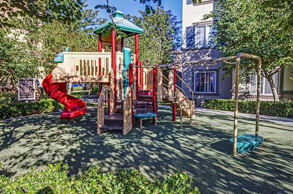 Playground with modern equipment at Ridgestone Apartments offering family-friendly amenities