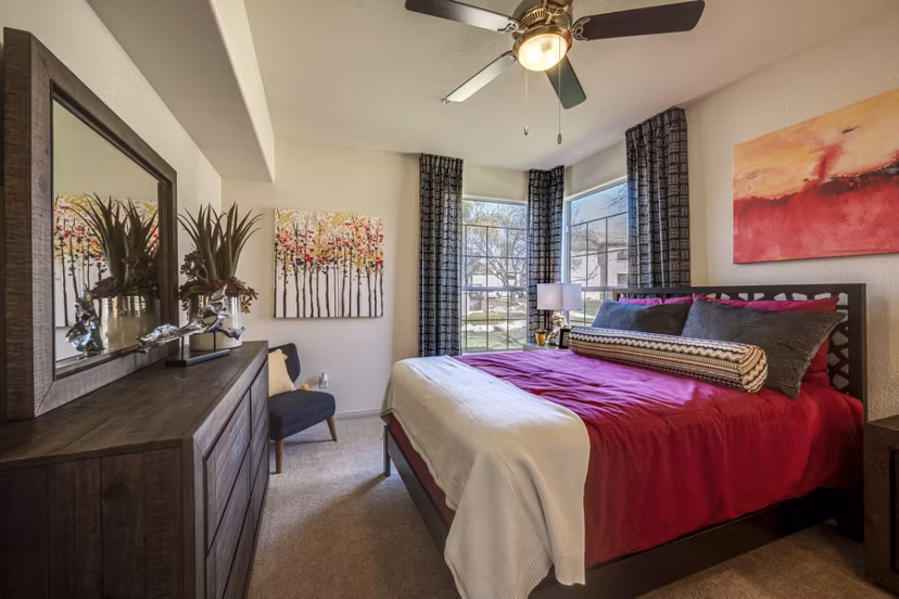 Cozy bedroom with modern decor at Solana Ridge Apartments, luxury living with comfort and style