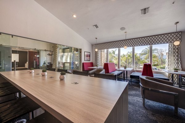 Clubhouse featuring modern design and seating areas at Solana Ridge Apartments
