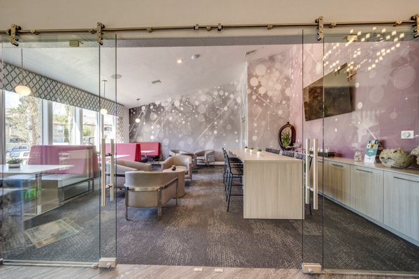 Clubhouse with stylish seating and modern decor at Solana Ridge Apartments, offering luxury living spaces in a vibrant community environment