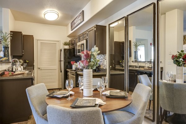 Elegant dining area with modern furnishings at Solana Ridge Apartments, showcasing stylish luxury living