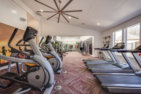 Modern fitness center featuring state-of-the-art equipment at Solana Ridge Apartments