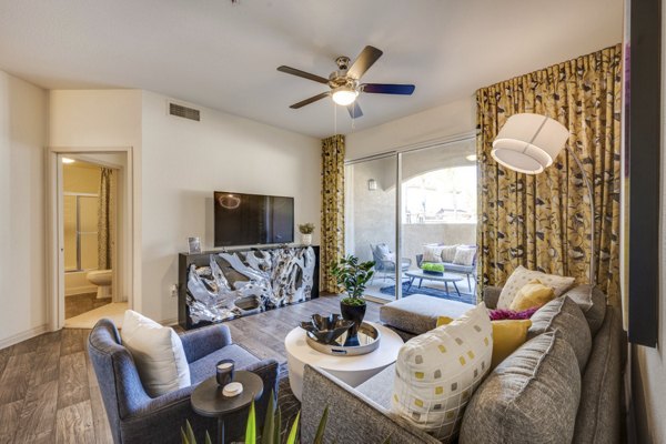 Stylish living room with modern furnishings and open layout at Solana Ridge Apartments