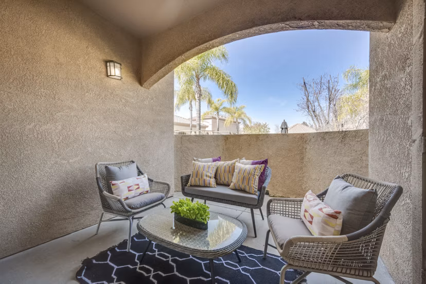 Spacious patio with modern furniture at Solana Ridge Apartments, ideal for outdoor relaxation