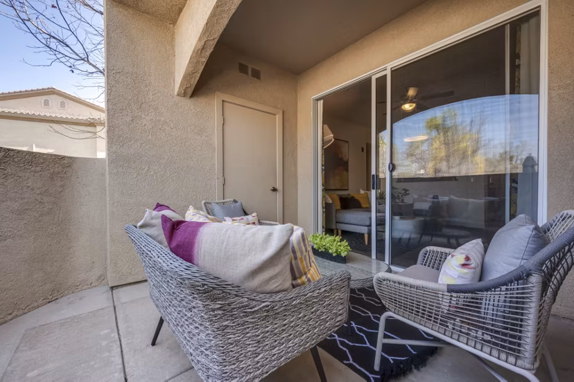 Cozy outdoor patio with modern seating at Solana Ridge Apartments for relaxation and socializing