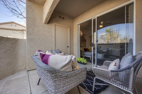 Cozy outdoor patio with modern seating at Solana Ridge Apartments for relaxation and socializing