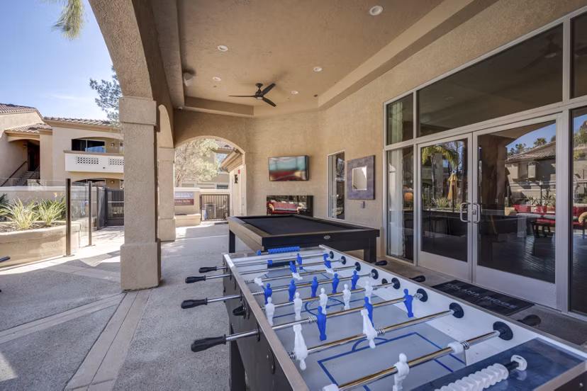 Patio with outdoor seating at Solana Ridge Apartments, luxury living in scenic surroundings