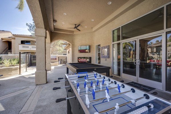 Patio with outdoor seating at Solana Ridge Apartments, luxury living in scenic surroundings