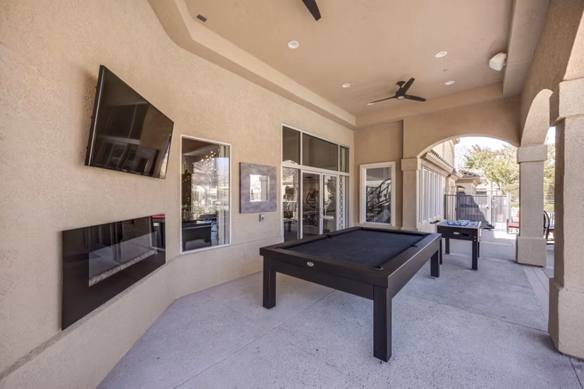 Spacious patio with contemporary seating at Solana Ridge Apartments, perfect for outdoor relaxation and socializing
