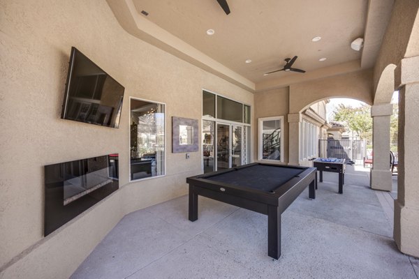 Spacious patio with contemporary seating at Solana Ridge Apartments, perfect for outdoor relaxation and socializing