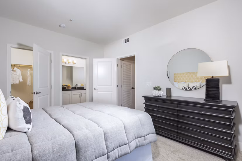 Bedroom offering modern design features at Sorano Apartments, luxury living with plush bedding and sleek furniture in a tranquil setting